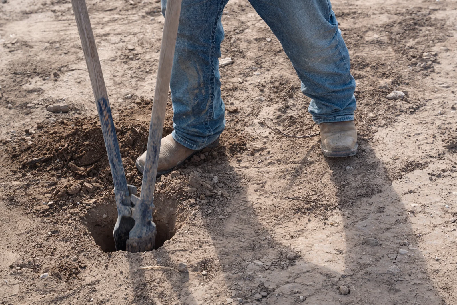 Turning the first earth on the site with hand tools